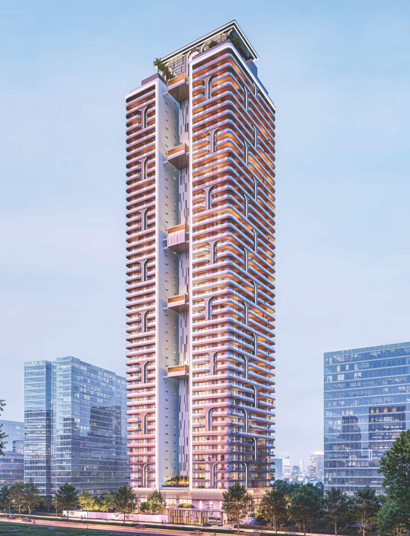 Golden Crest Infra luxury tower rising above the city at dusk